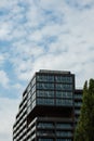 Modern glass office building exterior with glass facade on clear sky background. Transparent glass wall of office Royalty Free Stock Photo