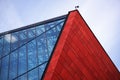 Modern glass and red brick building with blue sky background. metal structure glass business center Royalty Free Stock Photo