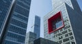 Modern Glass Skyscraper Architecture with Red Cube Feature and Blue Sky building Royalty Free Stock Photo