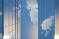 Modern glass skyscrapers, view from below looking up on clear sky with some clouds and reflections on windows, clean Royalty Free Stock Photo