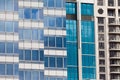 Modern glass-walled highriser building facade Royalty Free Stock Photo