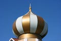 Modern gold dome with white stripes