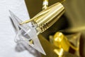 Modern gold and plastic electric light fitting Royalty Free Stock Photo