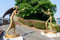 Modern golden sculpture of lover represent enternity love of King Suro and Queen Heo of Gaya Kingdom in Gimehae, South Gyeongsang