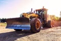 Modern grader in natural conditions at sunset Royalty Free Stock Photo