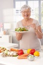 Modern grandmother eating healthy