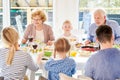 Modern Grandparents Enjoying Family Dinner Royalty Free Stock Photo