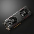 A modern graphics card on a dark background. It features a sleek, angular design with Royalty Free Stock Photo