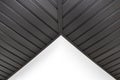 A modern graphite herringbone roof lining is attached to the trusses, visible H and J slats.