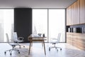 Modern gray CEO office with wooden cabinets, side view Royalty Free Stock Photo