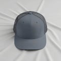 Modern gray mesh cap on light background Royalty Free Stock Photo