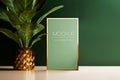 Modern green golden interior with golden mockup poster frame, plant in trendy vase