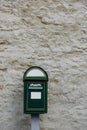 Modern green postbox