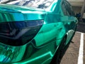 Modern Green Metallic Sedan Car Outdoors. Generic Contemporary Design, Brandless. Perspective.