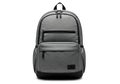 Modern grey backpack with multiple compartments and black accents Royalty Free Stock Photo