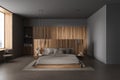 Modern grey bedroom interior with bed and shelf, panoramic window Royalty Free Stock Photo