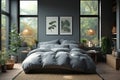 Modern grey bedroom with a large bed and a few potted plants Royalty Free Stock Photo