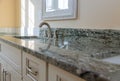 Modern grey marble countertop designer bathroom with sinks bathtub