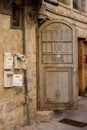 Modern grey metal door openwork with peaks a beautiful vintage background