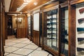 Modern gun store interior with different rifles on showcase Royalty Free Stock Photo