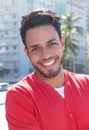 Modern guy with beard and red shirt at city Royalty Free Stock Photo