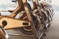 Modern gym interior with equipment, fitness exercise bikes Royalty Free Stock Photo