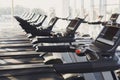 Modern gym interior equipment, treadmill control panels for cardio training Royalty Free Stock Photo
