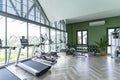 Modern Gym Room Fitness Center With Equipment And Machines. Royalty Free Stock Photo