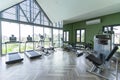 Modern Gym Room Fitness Center With Equipment And Machines. Royalty Free Stock Photo