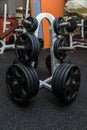 Modern Gym Room Fitness Center With Equipment And Machines. Interior of gym fitness room with large windows and treadmills Royalty Free Stock Photo