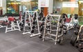 Modern Gym Room Fitness Center With Equipment And Machines. Interior of gym fitness room with large windows and treadmills Royalty Free Stock Photo