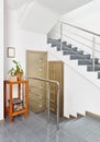 Modern hall with metal staircase interior Royalty Free Stock Photo