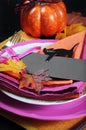 Modern Halloween Table Place Setting - vertical closeup. Royalty Free Stock Photo