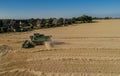 A modern harvester at the wheat harvest