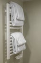 Modern Heated Towel Rail On Bathroom Wall. Modern Heated Towel Rail Royalty Free Stock Photo
