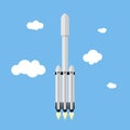 Modern heavy rocket on a background of sky and clouds