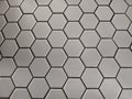 Modern hexagonal tile pattern creating a sleek, abstract background. Perfect for design projects. Royalty Free Stock Photo