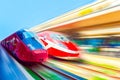 Modern hi-speed passenger train, in movement (motion) on railways station