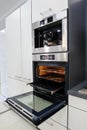 Modern hi-tek kitchen, oven with door open Royalty Free Stock Photo