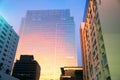 Modern high  building glass wall at evening time .sky reflection. Business district background Royalty Free Stock Photo