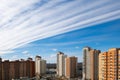 Modern high-rise architecture with scenic clouds on blue sky