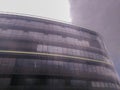 Modern high-rise building against a cloudy sky in Prague Royalty Free Stock Photo