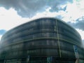 Modern high-rise building against a cloudy sky in Prague Royalty Free Stock Photo