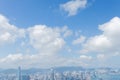 Highrise modern buildings with blue sky in the city at Victoria`s Peak, Hong Kong Royalty Free Stock Photo