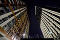 Modern high-rise residential buildings at night. Bottom view Royalty Free Stock Photo