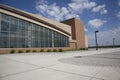 Modern high school with blue sky and clouds