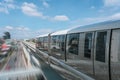 Modern high speed electric train departs from a station with motion blur effect Royalty Free Stock Photo