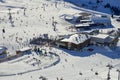 Modern high speed gondolas take hundreds of snow skiers up to the ski field of Ischgl in Austria to make the best of the Winter co