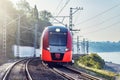 Modern high-speed train moves along the Black sea coast Royalty Free Stock Photo