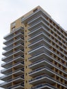 Modern highrise apartment building with large corner balconies Royalty Free Stock Photo